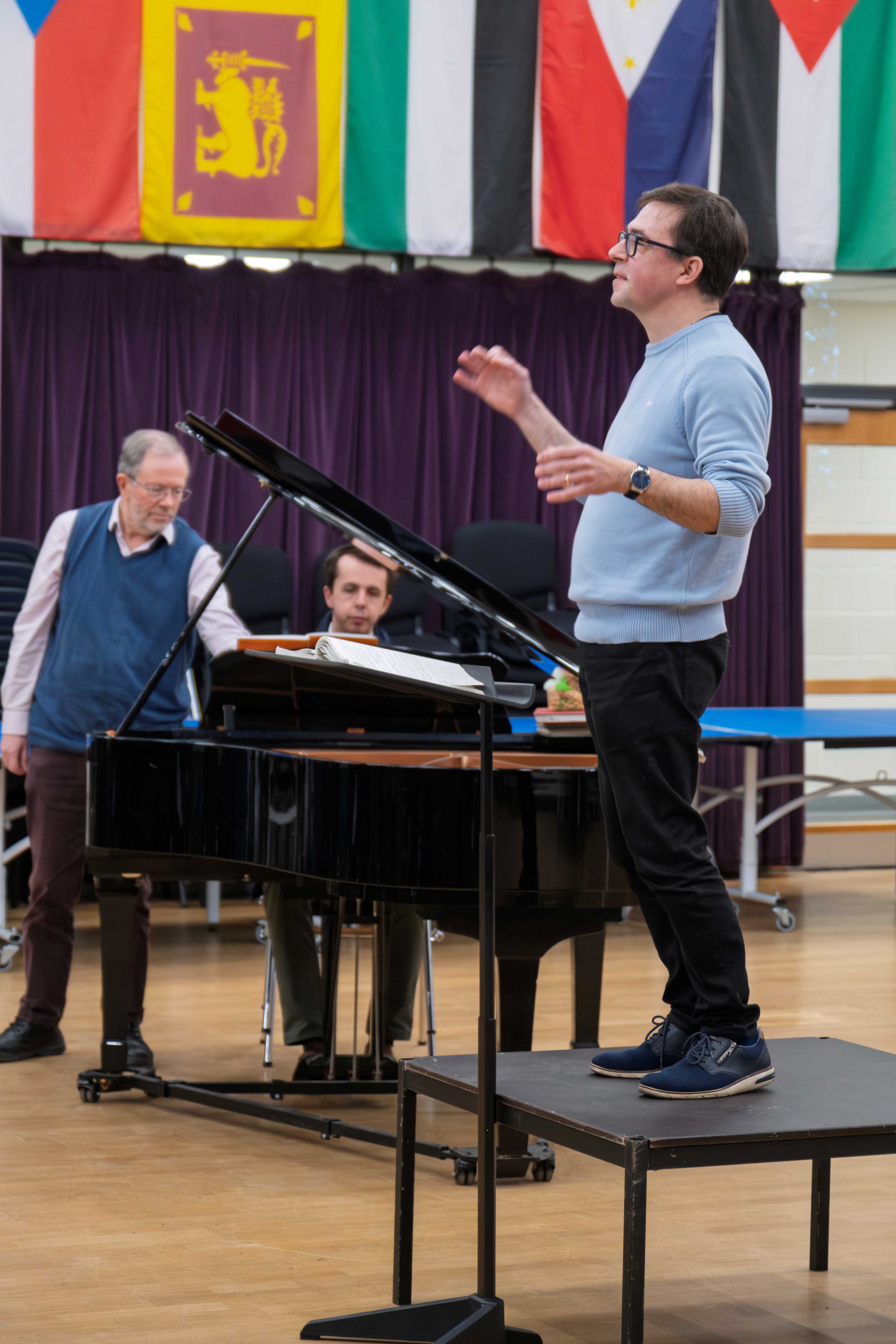 Richard Laing, our Music Director, conducting one of our regular Monday night rehearsals.  Behind him, seated at the piano, is our Accompanist, Jonathan Allsopp.